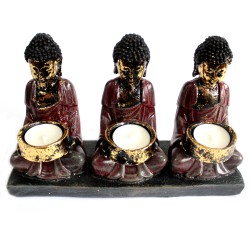 Buda antigo - suporte para vela com três devotos